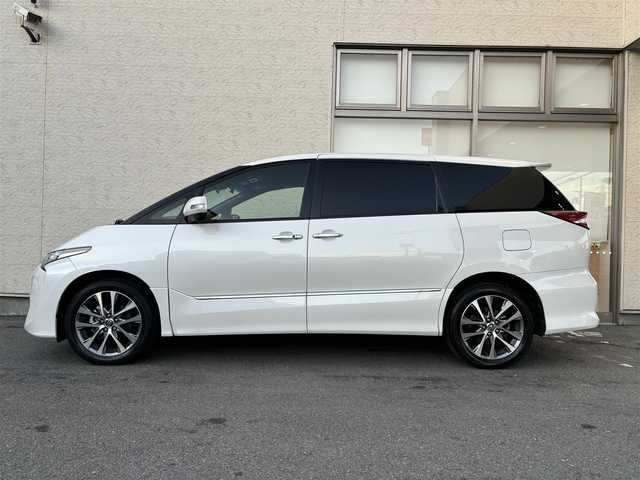 トヨタ エスティマ アエラス プレミアム G 大阪府 2017(平29)年 4.2万km ホワイトパールクリスタルシャイン 4WD/ワンオーナー/社外8型ナビ フルセグTV CD DVD BT/バックカメラ/両側パワースライドドア/パワーバックドア/衝突被害軽減ブレーキ/レーンアシスト/オートマチックハイビーム/LEDオートヘッドライト/ハーフレザーシート/前席シートヒーター/運転席パワーシート/ステアリングリモコン/スマートキー/ビルトインETC/ドラレコ/ウッドコンビステアリング/保証書 取説