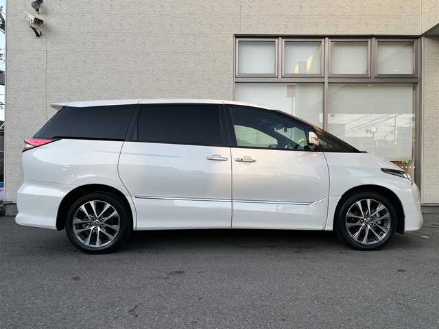 トヨタ エスティマ アエラス プレミアム G 大阪府 2017(平29)年 4.2万km ホワイトパールクリスタルシャイン 4WD/ワンオーナー/社外8型ナビ フルセグTV CD DVD BT/バックカメラ/両側パワースライドドア/パワーバックドア/衝突被害軽減ブレーキ/レーンアシスト/オートマチックハイビーム/LEDオートヘッドライト/ハーフレザーシート/前席シートヒーター/運転席パワーシート/ステアリングリモコン/スマートキー/ビルトインETC/ドラレコ/ウッドコンビステアリング/保証書 取説