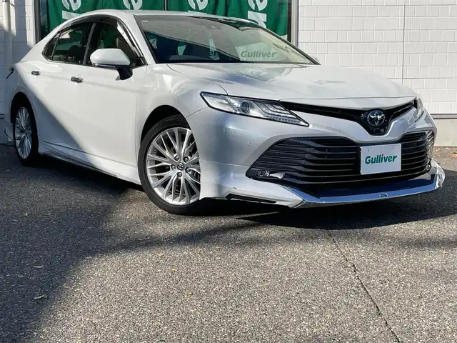 トヨタ カムリ G レザーパッケージ 新潟県 2020(令2)年 6.4万km プラチナホワイトパールマイカ ワンオーナー/モデリスタエアロ/メモリナビ/ワンセグテレビ/バックカメラ/ウィンカーミラー/クルーズコントロール/ドアバイザー/プッシュスタート/ETC2.0/運転助手席シートヒーター/運転助手席電動シート/Bluetooth/ブレーキホールド/電動パーキングブレーキ/走行モード/スペアキー1個