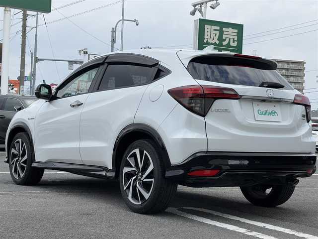 ホンダ ヴェゼル ハイブリッド RS ホンダセンシング 愛知県 2019(令1)年 5.1万km プラチナホワイトパール 純正8インチナビ(VXM-195VFi)/（CD・DVD/フルセグTV）/バックカメラ/純正ビルトインETC/純正18インチアルミホイール/衝突被害軽減ブレーキ/追従機能付クルーズコントロール/レーンキープアシスト/ハーフレザーシート/前席シートヒーター/LEDヘッドライト/オートライト/スマートキー/純正フロアマット/LEDスピーカーリング