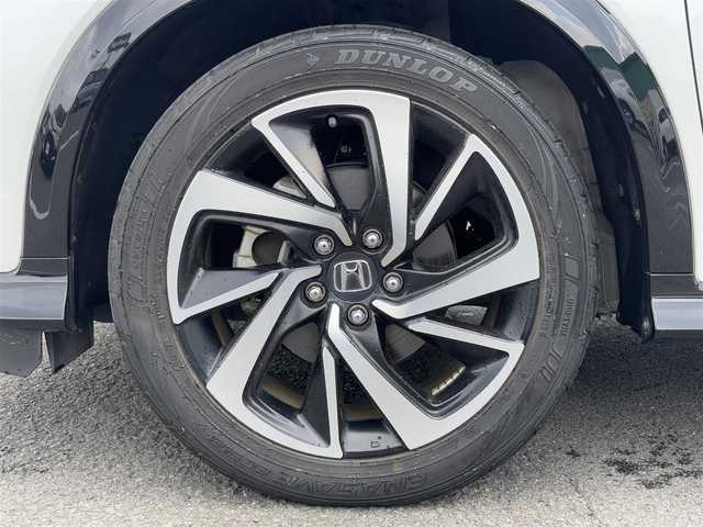 ホンダ ヴェゼル ハイブリッド RS ホンダセンシング 愛知県 2019(令1)年 5.1万km プラチナホワイトパール 純正8インチナビ(VXM-195VFi)/（CD・DVD/フルセグTV）/バックカメラ/純正ビルトインETC/純正18インチアルミホイール/衝突被害軽減ブレーキ/追従機能付クルーズコントロール/レーンキープアシスト/ハーフレザーシート/前席シートヒーター/LEDヘッドライト/オートライト/スマートキー/純正フロアマット/LEDスピーカーリング