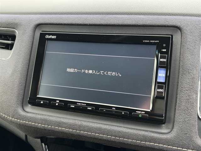 ホンダ ヴェゼル ハイブリッド RS ホンダセンシング 愛知県 2019(令1)年 5.1万km プラチナホワイトパール 純正8インチナビ(VXM-195VFi)/（CD・DVD/フルセグTV）/バックカメラ/純正ビルトインETC/純正18インチアルミホイール/衝突被害軽減ブレーキ/追従機能付クルーズコントロール/レーンキープアシスト/ハーフレザーシート/前席シートヒーター/LEDヘッドライト/オートライト/スマートキー/純正フロアマット/LEDスピーカーリング