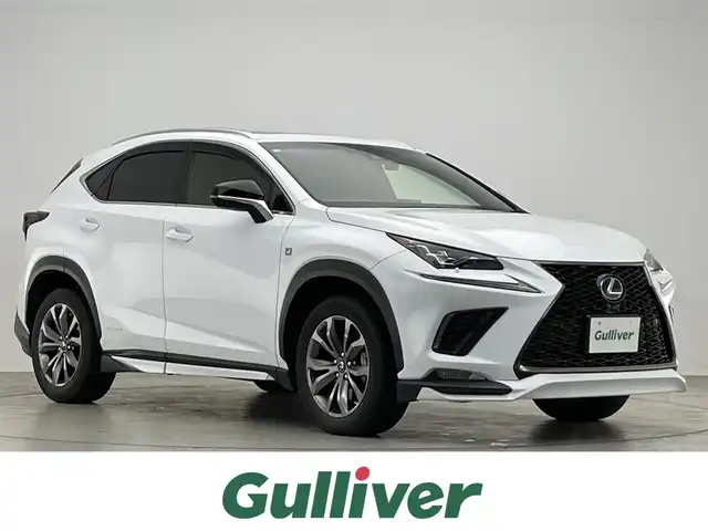 レクサス ＮＸ 300h Fスポーツ 滋賀県 2018(平30)年 6.8万km ホワイトノーヴァガラスフレーク 禁煙車/サンルーフ/純正ナビ/（CD/DVD/Bluetooth/フルセグTV)/全方位カメラ/TRDエアロ（F/S/R)/TRD4本出しマフラー/ビルトインETC2.0/前後ドラレコ/赤本革シート/前席シートヒーター/前席シートベンチレーション/前席パワーシート/ステアリングヒーター/パワーバックドア/ヘッドアップディスプレイ/BSM/3眼LEDヘッドライト/オートライト/オートハイビーム/プリクラッシュセーフティ/レーンディパーチャーアラート/レーダークルーズコントロール/クリアランスソナー/パドルシフト/電動パーキングブレーキ/オートブレーキホールド/プッシュスタート/スマートキー×２