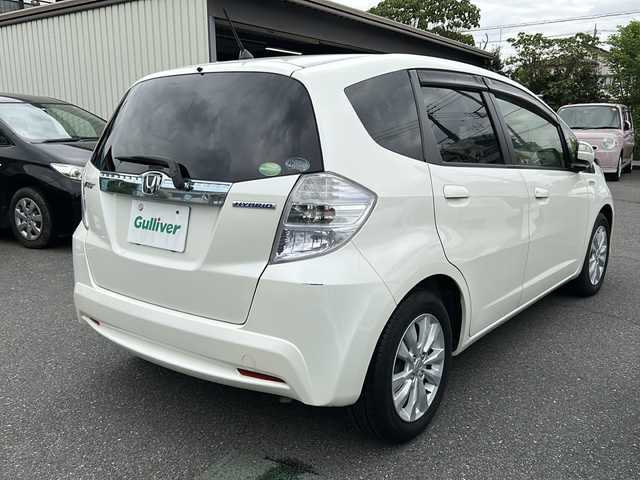 ホンダ フィット ハイブリット XHセレ ファインスタイル 埼玉県 2013(平25)年 1.7万km プレミアムホワイトパール ワンオーナー/ウィンカーミラー/ドアバイザー/ETC/AUX