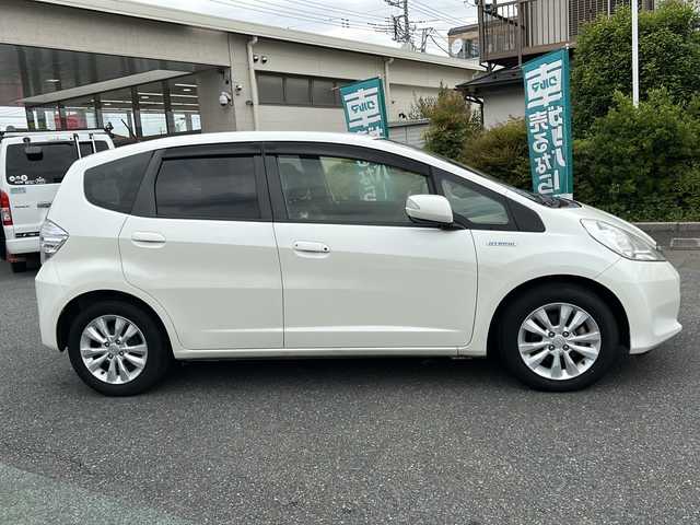 ホンダ フィット ハイブリット XHセレ ファインスタイル 埼玉県 2013(平25)年 1.7万km プレミアムホワイトパール ワンオーナー/ウィンカーミラー/ドアバイザー/ETC/AUX
