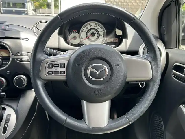 マツダ デミオ 13C－V 愛知県 2009(平21)年 4.9万km メトロポリタングレーマイカ ワンオーナー/純正オーディオ(FM/AM/CD/AUX)/電動格納ミラー/ETC/純正フロアマット/リモコンキー/ステアリングリモコン/ABS/保証書