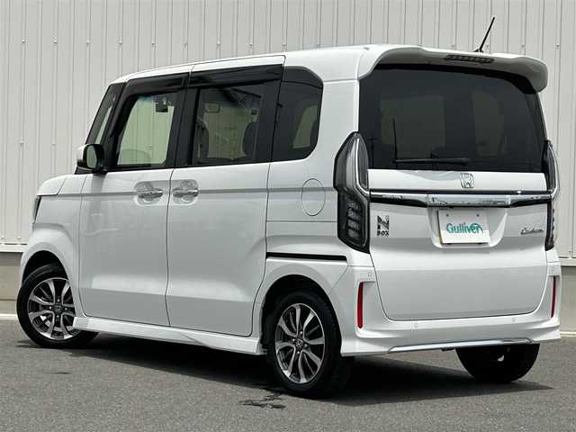 ホンダ Ｎ ＢＯＸ カスタム L 群馬県 2022(令4)年 1.6万km プラチナホワイトパール ワンオーナー/純正メモリーナビ/（DVD/CD/FM/AM/SD/Bluetooth/USB）/Honda SENSING/・アダプティブクルーズコントロール/・パーキングセンサー/・衝突軽減ブレーキ/・標識認識機能/・先行車発進お知らせ機能/・歩行者事故低減ステアリング/・路外逸脱抑制機能/・オートハイビーム/・誤発進抑制機能/助手席側電動スライドドア/8スピーカー/前後ドラレコ/ビルトインETC/純正アルミホイール/純正フロアマット/ドアバイザー/プッシュスタート/保証書/取扱説明書