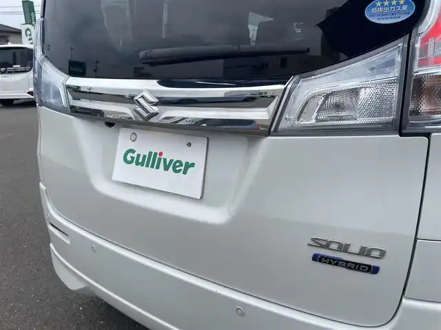 スズキ ソリオ HV SZ 山形県 2019(平31)年 6.6万km ピュアホワイトP 衝突軽減ブレーキ/レーンアシスト/両側パワースライドドア/全方位カメラ/メモリナビ/　【CD  DVD SD USB BT】/フルセグTV/前後ドライブレコーダー/ETC/ステアリングスイッチ/レーダークルーズコントロール/パドルシフト/シートヒーター/横滑り防止装置/コーナーセンサー/キセノンライト/フォグランプ/ウィンカーミラー/純正フロアマット/ドアバイザー
