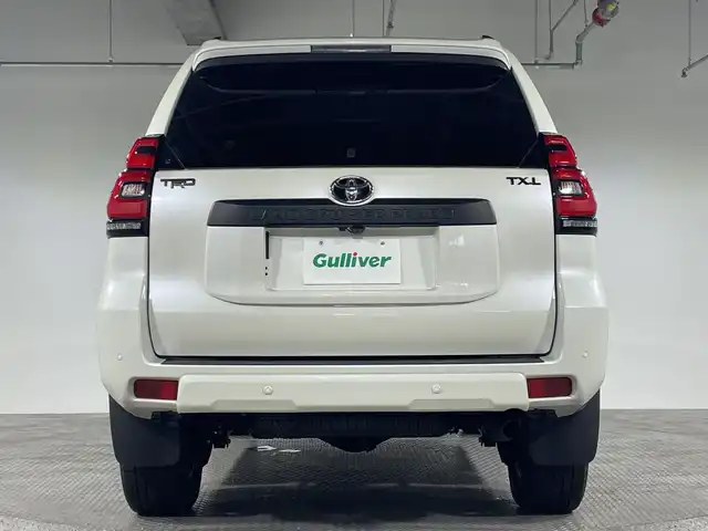 トヨタ ランドクルーザー プラド TX Lパッケージ マットブラED 愛知県 2023(令5)年 3.3万km ホワイトパールクリスタルシャイン トヨタセーフティセンス/・プリクラッシュセーフティ/・レーンディパーチャーアラート/・レーダークルーズコントロール/・オートマチックハイビーム/・ロードサインアシスト/純正ディスプレイオーディオ/・BT/フルセグTV/USB/MiraCast/ムーンルーフ/ビルトインETC2.0/4WD/MTモード/レザーシート/パワーシート(D/N)/シートヒーター(D/N)/ベンチレーション(D/N)/サード電動格納シート/BSM/ルーフレール/ドライブレコーダー/スマートキー/スペアキー/プッシュスタートボタン/革巻きステアリング/ステアリングスイッチ/Autoライト/ウッドコンビステアリング/コーナーセンサー/LEDヘッドライト/フォグランプ/電動格納ミラー/ウィンカーミラー/純正フロアマット/純正アルミホイール/純正ドアバイザー/サイド/カーテン/ニーエアバッグ