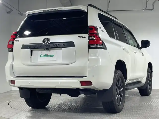 トヨタ ランドクルーザー プラド TX Lパッケージ マットブラED 愛知県 2023(令5)年 3.3万km ホワイトパールクリスタルシャイン トヨタセーフティセンス/・プリクラッシュセーフティ/・レーンディパーチャーアラート/・レーダークルーズコントロール/・オートマチックハイビーム/・ロードサインアシスト/純正ディスプレイオーディオ/・BT/フルセグTV/USB/MiraCast/ムーンルーフ/ビルトインETC2.0/4WD/MTモード/レザーシート/パワーシート(D/N)/シートヒーター(D/N)/ベンチレーション(D/N)/サード電動格納シート/BSM/ルーフレール/ドライブレコーダー/スマートキー/スペアキー/プッシュスタートボタン/革巻きステアリング/ステアリングスイッチ/Autoライト/ウッドコンビステアリング/コーナーセンサー/LEDヘッドライト/フォグランプ/電動格納ミラー/ウィンカーミラー/純正フロアマット/純正アルミホイール/純正ドアバイザー/サイド/カーテン/ニーエアバッグ
