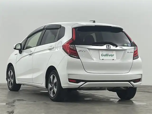 ホンダ フィット ハイブリット F 福島県 2020(令2)年 4.9万km タフタホワイトⅢ ホンダセンシング　/・ＡＣＣ　/・ＣＭＢＳ　/・ＬＫＡＳ　/・誤発進抑制機能　/・歩行者事故低減ステアリング　/・先行先行車発進お知らせ機能　/純正オーディオ　/・USB/CD/AM・FM/AUX/・ETC/ステアリングスイッチ　/プッシュスタート/・スマートキー/ハロゲンライト/・オートライト/・ヘッドライトリベライザー/電動格納ウィンカーミラー/・オートミラー/ドアバイザー