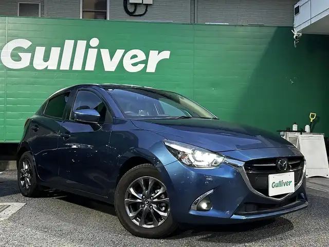 マツダ デミオ 15Sツーリング 東京都 2018(平30)年 0.7万km エターナルブルーマイカ ワンオーナー/純正マツダコネクトナビ/(CD/DVD//フルセグTV/BTオーディオ)/360°ビューモニター/レーダークルーズコントロール/ブラインドスポットモニター/パーキングセンサー/リアクロストラフィックアラート/車線逸脱警報システム/ドライバーアテンションアラート/交通標識認識システム/前後パーキングセンサー/前席シートヒーター/スマートシティブレーキアシスト/誤発信抑制制御/スペアキー×1/取扱説明書/保証書