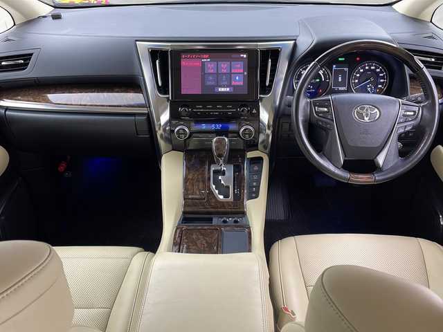 トヨタ アルファードハイブリット G Fパッケージ 大阪府 2023(令5)年 4.6万km ホワイトパールクリスタルシャイン ツインムーンルーフ/１２．１型後席モニター/純正９型ＤＡナビ/デジタルミラー/バックカメラ/ドライブレコーダー/ETC/ＴｏｙｏｔａＳａｆｅｔｙＳｅｎｓｅ/・プリクラッシュセーフティ/・レーントレーシングアシスト/・レーダークルーズコントロール/・ロードサインアシスト/・アダプティブハイビームシステム/ブラインドスポットモニター/パワーバックドア/両側パワースライドドア/メモリシート/シートヒーター/シートクーラー/ステアリングヒーター/パワーシート/純正AW/スペアキー/純正フロアマット