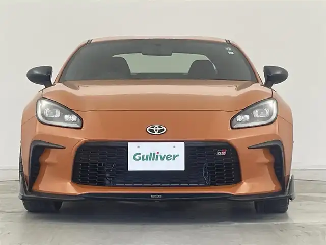 トヨタ ＧＲ８６ RZ 10thアニバーサリーLTD 群馬県 2023(令5)年 2.2万km フレイムオレンジ 特別仕様車　10thアニバーサリーリミテッド/＝＝＝＝＝＝/TOMSエアロ（フロント/トランク）/社外エクリプスナビ（AVN-LS02W)/・CD/DVD/Bluetooth/フルセグTV/バックカメラ/ハーフレザーシート/シートヒーター /クルーズコントロール/左右独立温度コントロールフルオートエアコン/Bi-Beam LEDヘッドランプ/（オートレベリング機能付＋LEDクリアランスランプ＋LEDターンランプ）/Rフォグランプ /マクファーソンストラット式フロントサスペンション/ダブルウィッシュボーン式リヤサスペンション/トルセンLSD（リミテッド・スリップ・デフ）/純正18インチアルミホイール/スマートキー /ETC/自動防眩ミラー