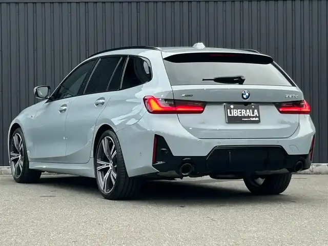 ＢＭＷ ＢＭＷ ３２０ｄ xDrive ツーリング Mスポーツ 福島県 2024(令6)年 1.2万km グレー ハンズ・オフ・アシスト/BMWヘッドアップ・ディスプレイ/アクティブ・クルーズ・コントロール（ストップ&ゴー機能付）/ステアリング&レーン・コントロール・アシスト/レーン・ディパーチャー・ウォーニング/レーン・キーピング・アシスト/レーン・チェンジ・ウォーニング/クロス・トラフィック・ウォーニング（フロント&リヤ）/クロスロード・ウォーニング/ワイヤレス・チャージング/ヴァーネスカ・レザー/パワーシート(前席)/シートヒーター(前席)/パワーリアゲート/フットオープナー/純正HDDナビ(BT/USB/Type-C)/360°カメラ/バックカメラ/純正19AW/ドライブレコーダー(前後)/ミラー一体型ETC