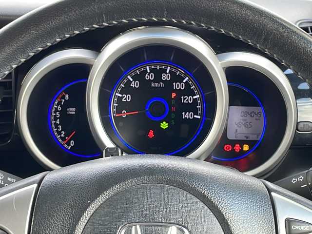 ホンダ Ｎ ＢＯＸ カスタム G ターボ Lパッケージ 山口県 2015(平27)年 8.4万km プレミアムホワイトパールⅡ (株)IDOMが運営する【じしゃロン宇部店】の自社ローン専用車両になります。こちらは現金またはオートローンご利用時の価格です。自社ローンご希望の方は別途その旨お申付け下さい。/純正ナビ　/バックモニター　/ドライブレコーダー　/チップアップシート　/ハーフレザーシート　/社外フロアマット　/両側パワースライドドア　/純正アルミホイール　/横滑り防止装置　/キセノンヘッドライト　/ＥＴＣ