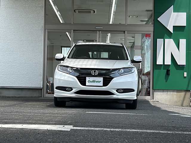 ホンダ ヴェゼル ハイブリッド Z 愛知県 2014(平26)年 8.4万km ホワイトオーキッドパール 禁煙車/ワンオーナー/純正インターナビ/ハーフレザーシート/寒冷地仕様/クルーズコントロール/パドルシフト/バックカメラ/パーキングアシスト/フルセグ/Bluetooth/ステアリングリモコン/HDMI/BREAKHOLD/シートヒーター（D/N席）/ECON/オートライト/フォグランプ/ドアバイザー/純正アルミ/純正フロアマット/ETC/スペアキー/取扱説明書/保証書
