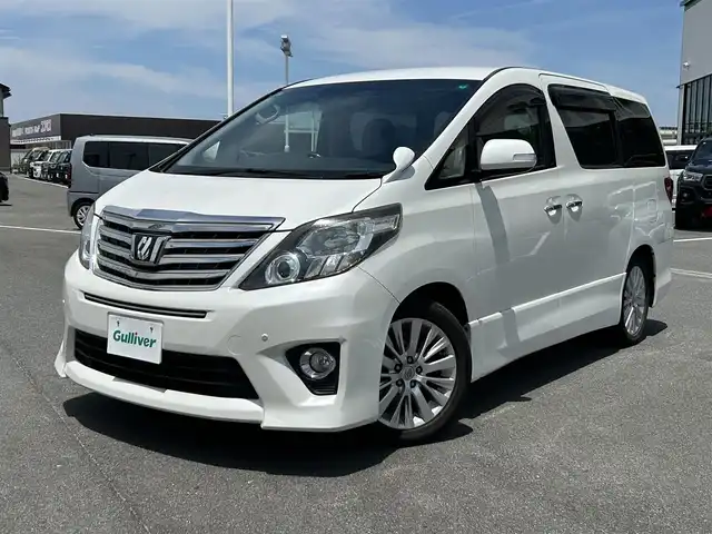 トヨタ アルファード 240S Cパッケージ 奈良県 2013(平25)年 7.1万km ホワイトパールクリスタルシャイン 純正メーカーナビ　/フルセグテレビ　/ｂｌｕｅｔｏｏｔｈ　/バックカメラ　/ビルトインＥＴＣ　/ｕｓｂ入力端子　/電動リアゲート　/パワーシート　/ポジションメモリー/２列目オットマン　/両側パワースライドドア　/コーナーセンサー/ナノイー/カーテンエアバッグ/100v電源/オートライト