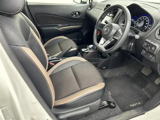 日産 ノート e－パワー メダリスト 熊本県 2018(平30)年 6.2万km ブリリアントホワイトパール 純正ナビ（ＣＤ・ＤＶＤ・フルセグ・ＢＴ・ＳＤ・ｉｐｏｄ・ＵＳＢ）/全周囲カメラ　/社外前方ドライブレコーダー　/ＥＴＣ　/前後クリアランスソナー　/レーダークルーズコントロール　/衝突軽減ブレーキ/エマージェンシーブレーキ/車線逸脱警報/踏み間違い防止アシスト/横滑り防止/ハーフレザーシート/オートライト/フォグライト/スマートキー/プッシュスタート/スペアキー1本/保証書/取扱説明書