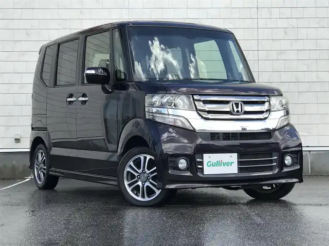 ホンダ Ｎ ＢＯＸ カスタム SSパッケージ 富山県 2015(平27)年 7.3万km プレミアムベルベットパープル・パール カロッツェリアナビ/ワンセグTV/両側パワースライドドア/バックカメラ/ビークルスタビリティアシスト/シティブレーキアクティブシステム/HIDオートヘッドランプ/オートエアコン/ステアリングスイッチ/前列ベンチシート/2列目チップアップシート/純正14インチアルミホイール/スマートキーシステム/プッシュエンジンスイッチ/禁煙車