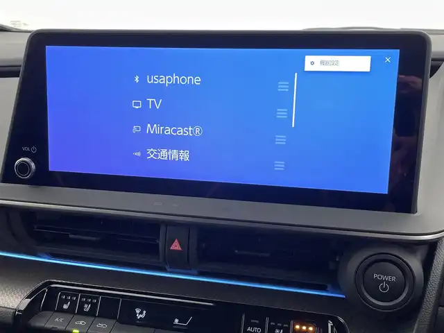 トヨタ プリウス Z 熊本県 2025(令7)年 1.2万km グレー ワンオーナー　/禁煙車　/純正１２．３インチディスプレイオーディオ（ApplCarPlay・AndroidAuto・BT・フルセグ・HDMI）/純正前後ドライブレコーダー　/パノラミックビュモニター/レーダークルーズコントロール/ビルトインＥＴＣ２．０　/衝突軽減ブレーキ/レーンキープアシスト/ブラインドスポットモニター/横滑り防止/パーキングアシスト/前後クリアランスソナー　/シートヒーター　/エアーシート　/ステアリングヒーター/１００Ｖ充電/社外フロアマット/純正19インチAW/オートライト/オートマチックハイビーム/LEDヘッドライト/スマートキー/プッシュスタート/スペアキー1本/保証書/取扱説明書