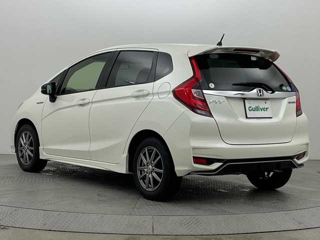 ホンダ フィット ハイブリット Sパッケージ 新潟県 2017(平29)年 2.6万km プレミアムホワイトパールⅡ 社外ナビ/　　フルセグ/CD/DVD/BT/バックカメラ/クルーズコントロール/LEDオートライト/純正アルミホイール車載/社外AW付サマータイヤ車載/ステアリングスイッチ/パドルシフト/アイドリングストップ/スマートキー/ETC