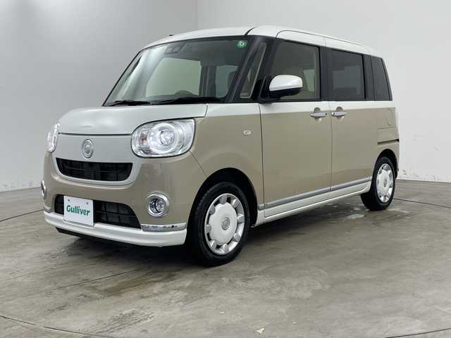 ダイハツ ムーヴ キャンバス G メイクアップ リミテッド　SAⅢ 兵庫県 2022(令4)年 2.2万km パールホワイトⅢ/ナチュラルベージュマイカメタリック 2トーン ・社外ナビ/CD/SD/TV/Bluetooth/・全方位カメラ/・運転席シートヒーター/・両側パワースライドドア/・スマートアシストIII/・衝突軽減ブレーキ/・誤発進抑制機能/・レーンキープアシスト/・オートマチックハイビーム/・ETC/・LEDヘッドランプ/・スマートキー/・アイドリングストップ/・電動格納ミラー/・フォグランプ