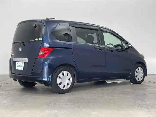 ホンダ フリード G ジャストセレクション 埼玉県 2009(平21)年 7.1万km プレミアムナイトブルーパール 社外7インチナビ/ CD DVD フルセグTV Bluetooth/バックカメラ/片側パワースライドドア/革調シートカバー/純正フロアマット/ドアバイザー/オートライト/スマートキー/ETC