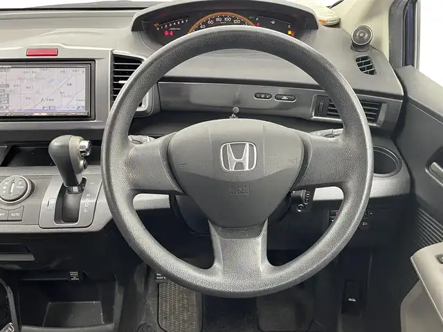 ホンダ フリード G ジャストセレクション 埼玉県 2009(平21)年 7.1万km プレミアムナイトブルーパール 社外7インチナビ/ CD DVD フルセグTV Bluetooth/バックカメラ/片側パワースライドドア/革調シートカバー/純正フロアマット/ドアバイザー/オートライト/スマートキー/ETC