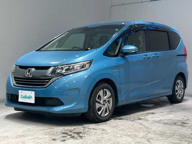 ホンダ フリード ハイブリット G ホンダセンシング 宮城県 2017(平29)年 8.8万km ブルーホライゾンM 純正ディーラーOPナビ/バックカメラ/フルセグTV/Bluetooth、CD、DVD/ホンダセンシング/・衝突軽減ブレーキ/・誤発進抑制機能/・アダプティブクルーズコントロール/・車線維持支援システム/・先行者発進お知らせ機能/ワイパーヒーター/両側パワースライドドア/3列シート/ウォークスルー/ベンチシート/LEDヘッドライト/オートライト/純正ビルトインETC/純正アルミホイール/純正フロアマット