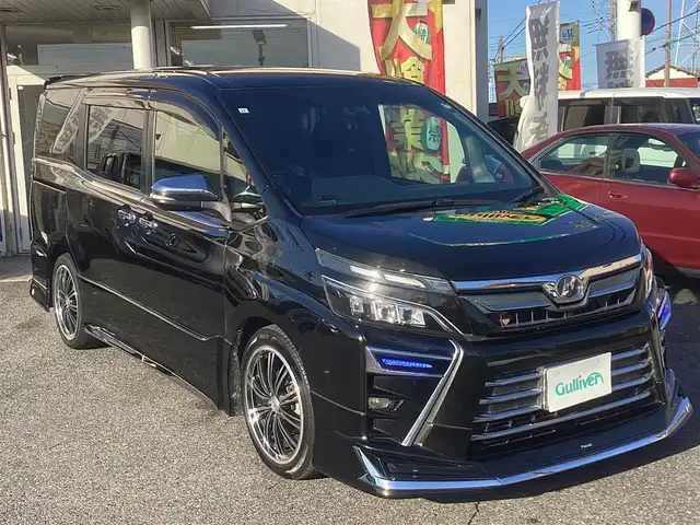 トヨタ ヴォクシー ZS 千葉県 2017(平29)年 6.3万km イナズマスパーキングブラックガラスフレーク Panasonicナビ/Bluetooth/DVD/CD/両側パワースライドドア/後席フリップダウンモニター/LEDヘッドライト/モデリスタエアロ/ワンオーナー /スペアスマートキーあり/ETC