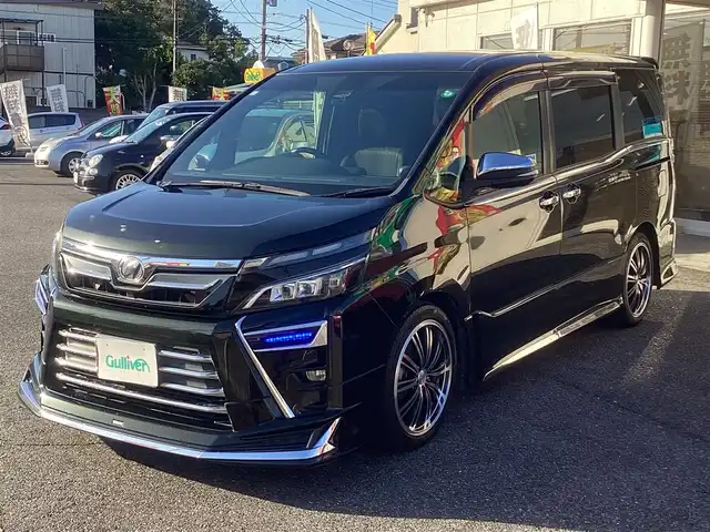 トヨタ ヴォクシー ZS 千葉県 2017(平29)年 6.3万km イナズマスパーキングブラックガラスフレーク Panasonicナビ/Bluetooth/DVD/CD/両側パワースライドドア/後席フリップダウンモニター/LEDヘッドライト/モデリスタエアロ/ワンオーナー /スペアスマートキーあり/ETC
