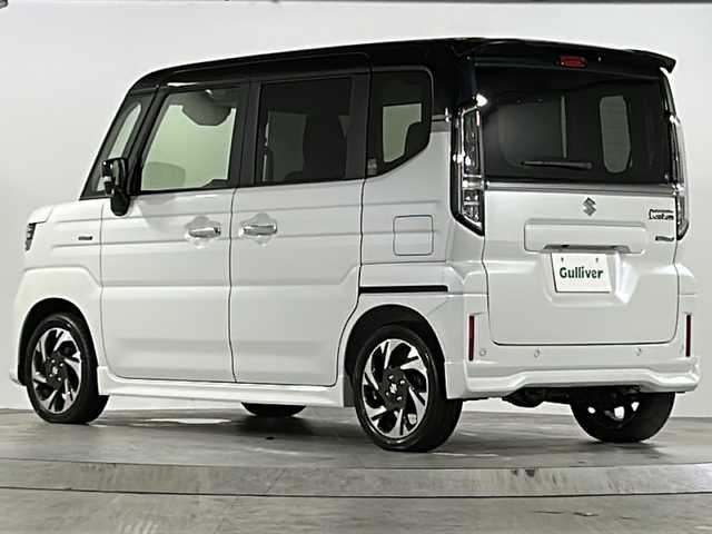 スズキ スペーシア カスタム HYBRID XS ターボ 広島県 2024(令6)年 0.1千km ピュアホワイトパール/ブラック2トーン 禁煙車/登録時7ｋｍ/フルタイム4ＷＤ/インタークーラーターボ/スズキセーフティサポート/・デュアルセンサーブレーキサポートII/・先行車発進お知らせ/・標識認識機能/・ヘッドアップディスプレイ/・誤発進抑制機能/・ハイビームアシスト/・アダプティブクルーズコントロール/・車線維持支援機能/・車線逸脱抑制/・車線逸脱警報/・ふらつき警報/コーナーセンサー/全方位モニター付９型メモリーナビ/・フルセグ/Bluetooｔｈ/ＵＳＢ/スマホ連携/スズキコネクト対応通信機装着車/両側パワースライドドア/革巻きステアリング/ステアリングスイッチ/パドルシフト/オートライト/LEDヘッドライト/フォグランプ/ハーフレザーシート/シートヒーター/アイドリングストップ/スマートキー/プッシュスタート/スペアキー/純正15インチアルミホイール