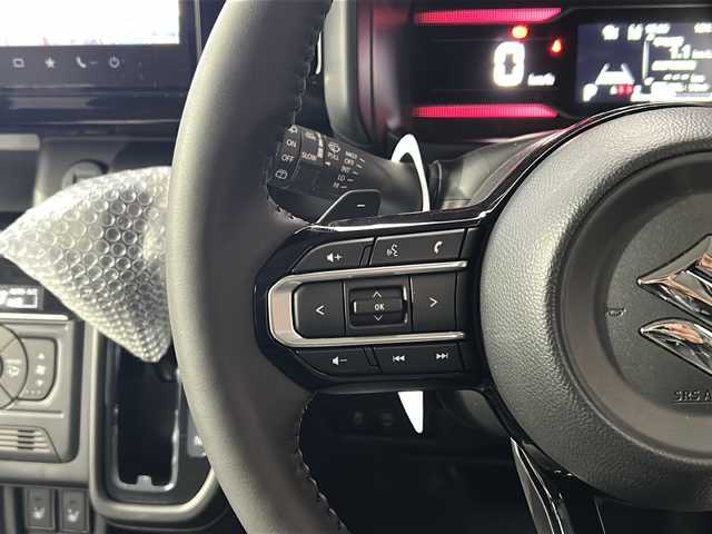 スズキ スペーシア カスタム HYBRID XS ターボ 広島県 2024(令6)年 0.1千km ピュアホワイトパール/ブラック2トーン 禁煙車/登録時7ｋｍ/フルタイム4ＷＤ/インタークーラーターボ/スズキセーフティサポート/・デュアルセンサーブレーキサポートII/・先行車発進お知らせ/・標識認識機能/・ヘッドアップディスプレイ/・誤発進抑制機能/・ハイビームアシスト/・アダプティブクルーズコントロール/・車線維持支援機能/・車線逸脱抑制/・車線逸脱警報/・ふらつき警報/コーナーセンサー/全方位モニター付９型メモリーナビ/・フルセグ/Bluetooｔｈ/ＵＳＢ/スマホ連携/スズキコネクト対応通信機装着車/両側パワースライドドア/革巻きステアリング/ステアリングスイッチ/パドルシフト/オートライト/LEDヘッドライト/フォグランプ/ハーフレザーシート/シートヒーター/アイドリングストップ/スマートキー/プッシュスタート/スペアキー/純正15インチアルミホイール