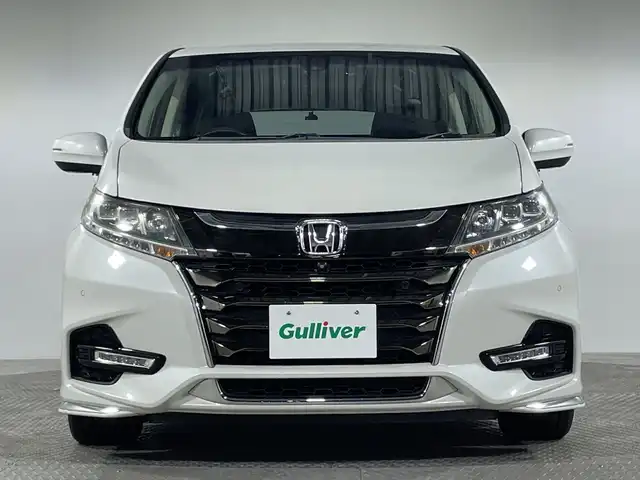 ホンダ オデッセイ アブソルート・EXホンダセンジング 神奈川県 2019(令1)年 2.2万km プラチナホワイトパール ホンダセンシング/純正8型SDナビゲーション【VXM-197VFNi】/・BT/フルセグTV/CD/DVD/SD/USB/HDMI/全方位モニター/パーキングアシスト/両側電動スライドドア/ハーフレザーシート/パワーシート(D/N)/シートヒーター(D/N)/二列目オットマン/ビルトインETC2.0/前後ドライブレコーダー/スマートキー/スペアキー/プッシュスタートボタン/革巻きステアリング/ステアリングスイッチ/パドルシフト/Autoライト/ECON/コーナーセンサー/LEDヘッドライト/フォグランプ/電動格納ミラー/ウィンカーミラー/純正フロアマット/純正ドアバイザー/純正17インチアルミホイール