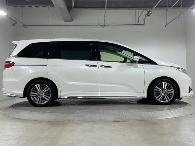 ホンダ オデッセイ アブソルート・EXホンダセンジング 神奈川県 2019(令1)年 2.2万km プラチナホワイトパール ホンダセンシング/純正8型SDナビゲーション【VXM-197VFNi】/・BT/フルセグTV/CD/DVD/SD/USB/HDMI/全方位モニター/パーキングアシスト/両側電動スライドドア/ハーフレザーシート/パワーシート(D/N)/シートヒーター(D/N)/二列目オットマン/ビルトインETC2.0/前後ドライブレコーダー/スマートキー/スペアキー/プッシュスタートボタン/革巻きステアリング/ステアリングスイッチ/パドルシフト/Autoライト/ECON/コーナーセンサー/LEDヘッドライト/フォグランプ/電動格納ミラー/ウィンカーミラー/純正フロアマット/純正ドアバイザー/純正17インチアルミホイール