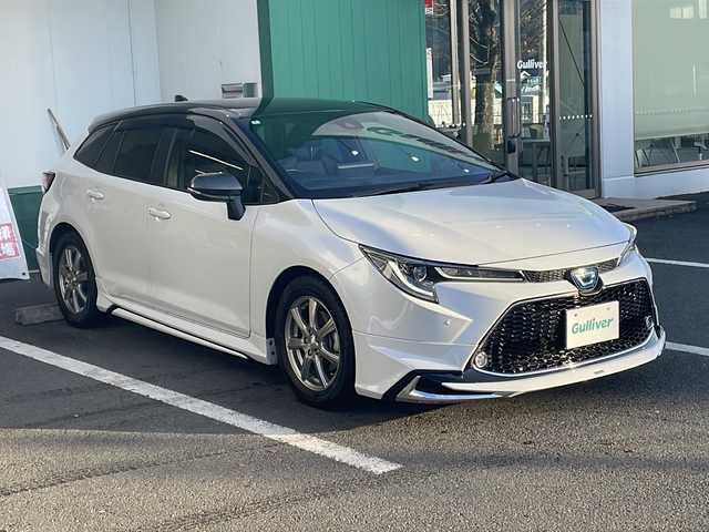 トヨタ カローラツーリング ハイブリッド ダブルバイビー 京都府 2022(令4)年 4.1万km ブラックマイカ/プラチナホワイトパールマイカ モデリスタエアロ　純正ディスプレイオーディオ　ナビ　フルセグ　Ｂｌｕｅｔｏｏｔｈオーディオ　ＤＶＤ再生　レーダークルーズ　ＬＥＤヘッドライト　クリアランスソナー　ビルトインＥＴＣ　スマートキー　禁煙車