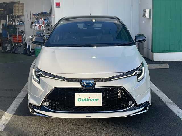 トヨタ カローラツーリング ハイブリッド ダブルバイビー 京都府 2022(令4)年 4.1万km ブラックマイカ/プラチナホワイトパールマイカ モデリスタエアロ　純正ディスプレイオーディオ　ナビ　フルセグ　Ｂｌｕｅｔｏｏｔｈオーディオ　ＤＶＤ再生　レーダークルーズ　ＬＥＤヘッドライト　クリアランスソナー　ビルトインＥＴＣ　スマートキー　禁煙車