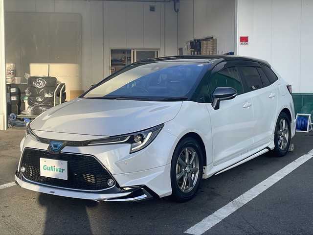 トヨタ カローラツーリング ハイブリッド ダブルバイビー 京都府 2022(令4)年 4.1万km ブラックマイカ/プラチナホワイトパールマイカ モデリスタエアロ　純正ディスプレイオーディオ　ナビ　フルセグ　Ｂｌｕｅｔｏｏｔｈオーディオ　ＤＶＤ再生　レーダークルーズ　ＬＥＤヘッドライト　クリアランスソナー　ビルトインＥＴＣ　スマートキー　禁煙車