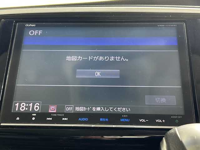 ホンダ オデッセイ ハイブリッド アブソルート ホンダセンシング 神奈川県 2016(平28)年 6.5万km プレミアムヴィーナスブラックP 純正８型SDナビゲーション【VXM-175VFNi】/フルセグ　CD DVD　SDMUSICRACK　AM FM/バックカメラ/両側電動スライドドア【サンシェード】/ホンダセンシング/衝突軽減ブレーキ/歩行者事故低減ステアリング/アダブティブクルーズコントロール/LKAS車線維持支援システム/路外逸脱抑制機能/誤発進抑制機能/先行車発進お知らせ機能/標識認識機能/前後ソナー/コンフォートビューパッケージ/ECON/EVモード/純正前方ドライブレコーダー/純正ビルトインETC/ブラックプライムスムース合皮/ファブリックコンビシート/運転席パワーシート/２列目オットマン/革巻きステアリング/プッシュスタート/スマートキー/LEDヘッドランプ/オートライト/フロントフォグランプ/純正リアスポイラー/純正17インチアルミホイール