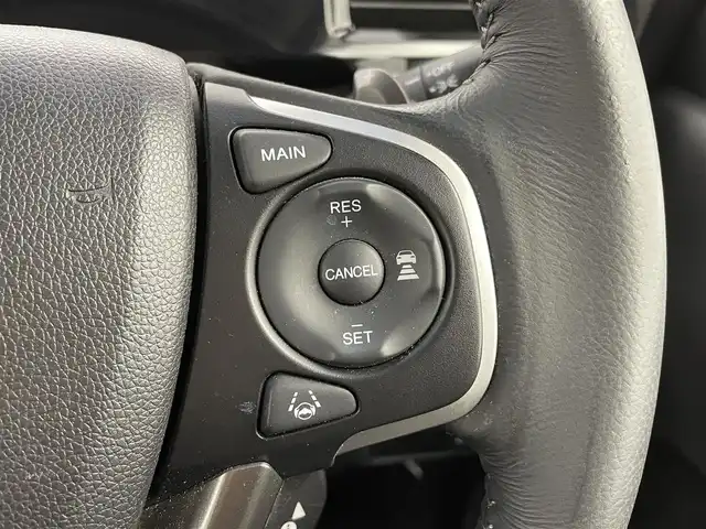 ホンダ ステップワゴン スパーダ クルスピセンシング 大分県 2015(平27)年 6.2万km ホワイトオーキッドパール 純正9インチインターナビ/フルセグTV/ーDISC/ーBluetooth/バックカメラ/ハーフレザー/両側パワースライドドア/ホンダセンシング/衝突軽減ブレーキ/先行車発進お知らせ機能/ACC先行車検知音/標識認識機能/路外逸脱抑制システム/LEDヘッドライト/無限エアロ/純正フリップダウンモニター/レーダークルーズコントロール/オートライト/純正16インチアルミホイール/純正フロアマット/ＥＴＣ/ドライブレコーダー/前席シートヒーター/横滑り防止装置