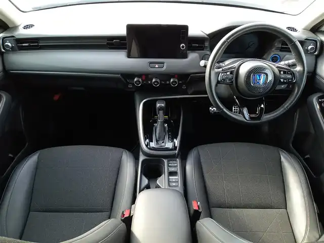 ホンダ ヴェゼル ハイブリッド e:HEV Z 福井県 2021(令3)年 1.9万km プラチナホワイトパール 純正9インチナビ/AM/FM/フルセグ/BT/USB/バックカメラ/無限エアロ/アダプティブクルーズコントロール/前後コーナーセンサー/衝突被害軽減システム/BSM/レーンキープアシスト/横滑り防止装置/ETC２．０/ワイヤレス充電/前後ドライブレコーダー/SOSボタン/前席シートヒーター/オートブレーキホールド/ハーフレザーシート/ステアリングヒーター/電動リアゲート/純正フロアマット/パドルシフト/純正18インチAW/LEDヘッドライト/スマートキー