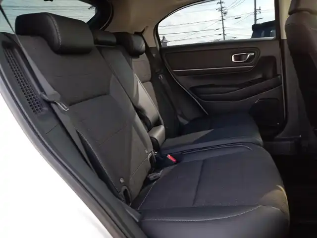 ホンダ ヴェゼル ハイブリッド e:HEV Z 福井県 2021(令3)年 1.9万km プラチナホワイトパール 純正9インチナビ/AM/FM/フルセグ/BT/USB/バックカメラ/無限エアロ/アダプティブクルーズコントロール/前後コーナーセンサー/衝突被害軽減システム/BSM/レーンキープアシスト/横滑り防止装置/ETC２．０/ワイヤレス充電/前後ドライブレコーダー/SOSボタン/前席シートヒーター/オートブレーキホールド/ハーフレザーシート/ステアリングヒーター/電動リアゲート/純正フロアマット/パドルシフト/純正18インチAW/LEDヘッドライト/スマートキー