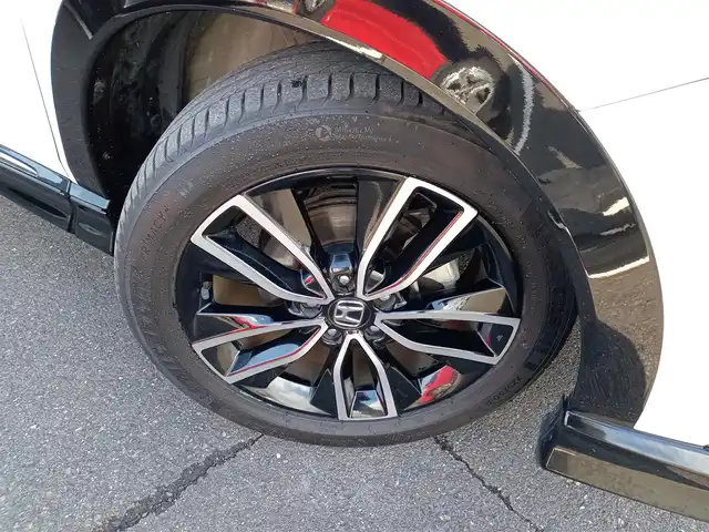 ホンダ ヴェゼル ハイブリッド e:HEV Z 福井県 2021(令3)年 1.9万km プラチナホワイトパール 純正9インチナビ/AM/FM/フルセグ/BT/USB/バックカメラ/無限エアロ/アダプティブクルーズコントロール/前後コーナーセンサー/衝突被害軽減システム/BSM/レーンキープアシスト/横滑り防止装置/ETC２．０/ワイヤレス充電/前後ドライブレコーダー/SOSボタン/前席シートヒーター/オートブレーキホールド/ハーフレザーシート/ステアリングヒーター/電動リアゲート/純正フロアマット/パドルシフト/純正18インチAW/LEDヘッドライト/スマートキー