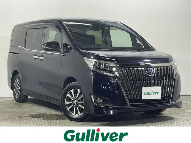 トヨタ エスクァイア ハイブリッド Gi プレミアムパッケージ ブラックテーラード 大阪府 2020(令2)年 4.1万km スパークリングブラックパールクリスタルシャイン 純正9incナビ(フルセグ/DVD再生/Bluetooth) バックカメラ 後席モニター ETC 両側パワースライドドア ハーフレザー シートヒーター 衝突軽減 トヨタセーフティセンス 前後ドラレコ