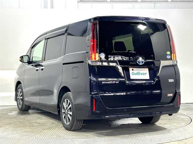 トヨタ エスクァイア ハイブリッド Gi プレミアムパッケージ ブラックテーラード 大阪府 2020(令2)年 4.1万km スパークリングブラックパールクリスタルシャイン 純正9incナビ(フルセグ/DVD再生/Bluetooth) バックカメラ 後席モニター ETC 両側パワースライドドア ハーフレザー シートヒーター 衝突軽減 トヨタセーフティセンス 前後ドラレコ