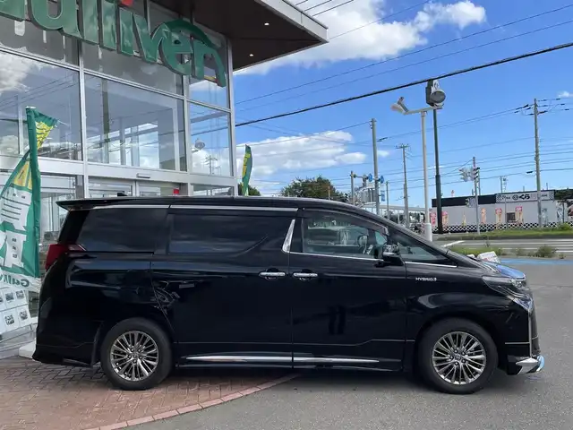 トヨタ アルファードハイブリット エグゼクティブ ラウンジ S 道央・札幌 2020(令2)年 1.9万km ブラック 登録時走行距離　18421km/　4　W　D　/純正メモリナビ(AM/FM/BT)/フルセグテレビ(走行中視聴可)/全方位モニター/ウィンカーミラー/ルーフカラーイルミネーション/キャプテンシート/クルーズコントロール(追従走行あり)/純正フリップダウンモニター/ドアバイザー/プッシュスタート/両側パワースライドドア/ビルトインETC/シートメモリ/ステアリングスイッチ/ステアリングヒーター/オートブレーキホールド/ルームミラーモニター/後席オットマン/キャプテンシート/コーナーセンサー/シートヒーター/フォグランプ/エンジンスターター