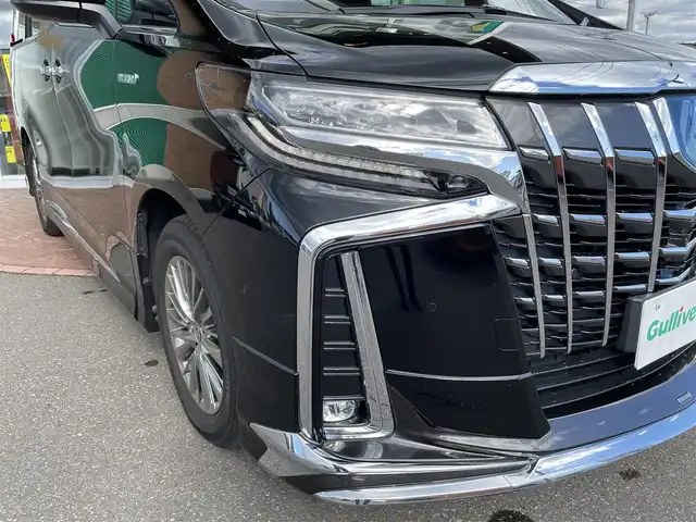トヨタ アルファードハイブリット エグゼクティブ ラウンジ S 道央・札幌 2020(令2)年 1.9万km ブラック 登録時走行距離　18421km/　4　W　D　/純正メモリナビ(AM/FM/BT)/フルセグテレビ(走行中視聴可)/全方位モニター/ウィンカーミラー/ルーフカラーイルミネーション/キャプテンシート/クルーズコントロール(追従走行あり)/純正フリップダウンモニター/ドアバイザー/プッシュスタート/両側パワースライドドア/ビルトインETC/シートメモリ/ステアリングスイッチ/ステアリングヒーター/オートブレーキホールド/ルームミラーモニター/後席オットマン/キャプテンシート/コーナーセンサー/シートヒーター/フォグランプ/エンジンスターター