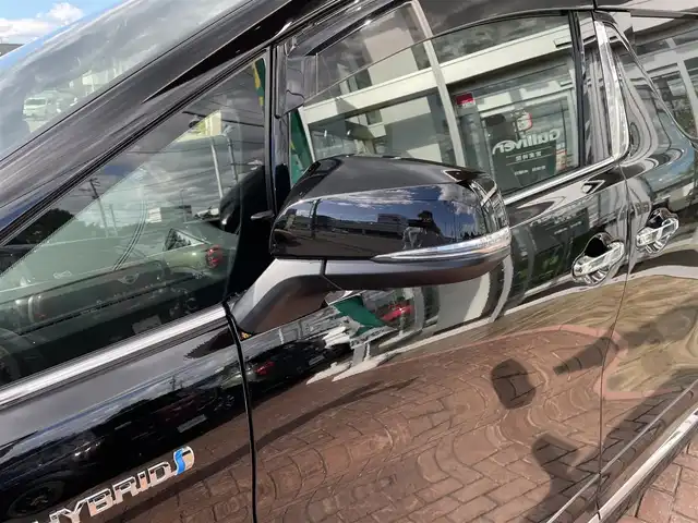 トヨタ アルファードハイブリット エグゼクティブ ラウンジ S 道央・札幌 2020(令2)年 1.9万km ブラック 登録時走行距離　18421km/　4　W　D　/純正メモリナビ(AM/FM/BT)/フルセグテレビ(走行中視聴可)/全方位モニター/ウィンカーミラー/ルーフカラーイルミネーション/キャプテンシート/クルーズコントロール(追従走行あり)/純正フリップダウンモニター/ドアバイザー/プッシュスタート/両側パワースライドドア/ビルトインETC/シートメモリ/ステアリングスイッチ/ステアリングヒーター/オートブレーキホールド/ルームミラーモニター/後席オットマン/キャプテンシート/コーナーセンサー/シートヒーター/フォグランプ/エンジンスターター