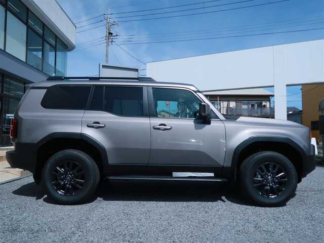 トヨタ ランドクルーザー ２５０ VX 千葉県 2025(令7)年 0.1千km アバンギャルドブロンズメタリック 登録済未使用車/トヨタチームメイト/・ドライバーモニターカメラ/・緊急時操舵支援/・フロントクロストラフィックアラート（FCTA）/・レーンチェンジアシスト（LCA）/ルーフレール/デジタルインナーミラー/ドライブレコーダー/12.3インチディスプレイオーディオ/・フルセグTV/・マルチビューカメラ/・Bluetooth/トヨタセーフティセンス/・プリクラッシュセーフティ/・レーントレーシングアシスト/・レーンディパーチャーアラート/・レーダークルーズコントロール/・アダクティブハイビームアシスト/・ロードサインアシスト/・ドライバー異常対応システム/・プロアクティブドライビングアシスト/・発進遅れ告知機能/・緊急操舵支援/・フロントクロストラフィックアラート/・レーンテェンジアシスト/LEDヘッドライト/フォグライト/シートヒーター/ベンチレーション/ステアリングヒーター/クロレザーシート/パワーバックドア/ETC2.0/ブレーキホールド/プッシュスタート/スマートキー×2/保証書